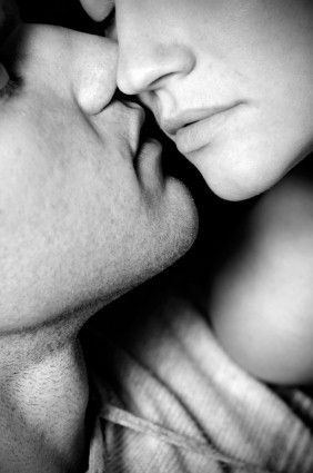 woman and man kissing