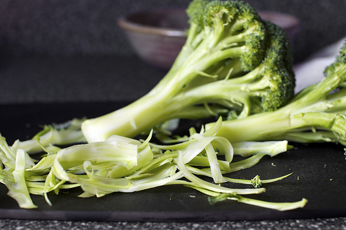 peeling the broccoli stems