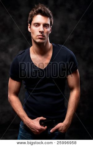 Fashion Shot of a Young Man A trendy European man dressed in contemporary cloth. He is now a professional model. | Stock photo