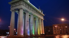The Moscow Triumphal Gate lit up witih rainbow lights - CC photo from Wikimedia Commons