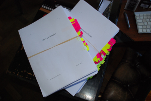 The three manuscripts, completed, with post-it notes to show the corrections. A lot of work!