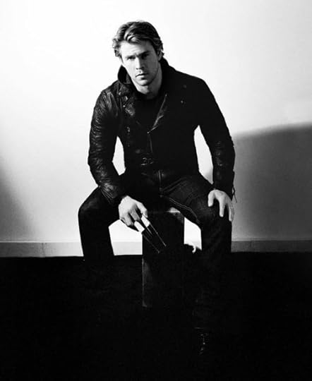 chris hemsworth sitting