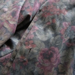 Detail of Sally Felt's beloved vintage raincoat.