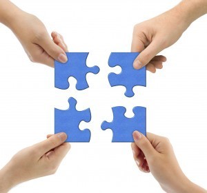hands with a puzzle