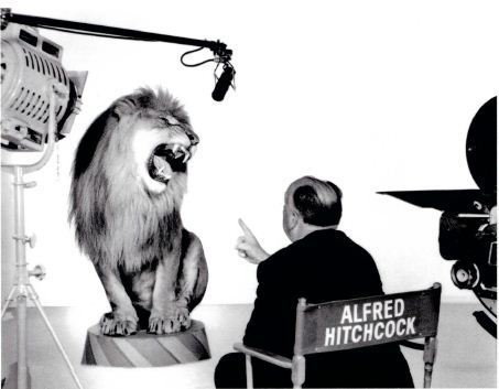 Alfred Hitchcock with the MGM lion, 1958. Photograph by Clarence Sinclair Bull from the John Kobal Foundation Archive.