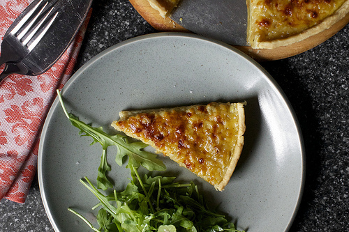 french onion tart, little tuft of salad