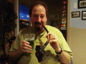 "Cole E. Coe.": The pipe is made from leftover limbs and bones. Yes, that's real zombie juice in the cup.