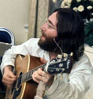 English: John Lennon rehearses Give Peace A Ch...