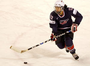 Julie Chu with Team USA in 2009