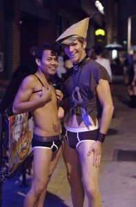 Two cute young men in costumes