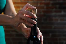 crack open bottle of wine