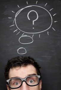 Image of a person with a question mark on a chalkboard