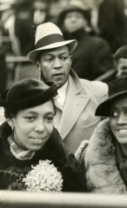 Jesse and Ruth Owens sitting with an unknown group of people, ci