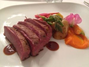 Seared Theisson Farms Muscovy Duck Breast with carrot puree and farmer's vegetables. Excellent.