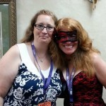 Here's Laurie Garrison of Bitten By Paranormal Romance (and organizer of IRC) posing with Red Phoenix, BDSM author who gave out some really cool swag and was on the BDSM panel. (They did demonstrations that were a huge hit!) (http://www.bittenbyparanormalromance.com) (http://redphoenixauthor.blogspot.ca)