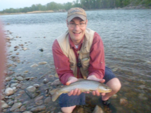 Even Dad gets to reel in one nice trout that night. 