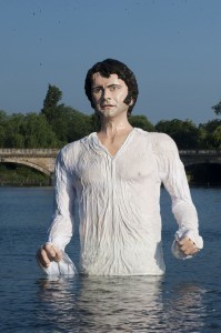 A giant statue of Mr. Darcy emerges from Serpentine Lake at Hyde Park in London