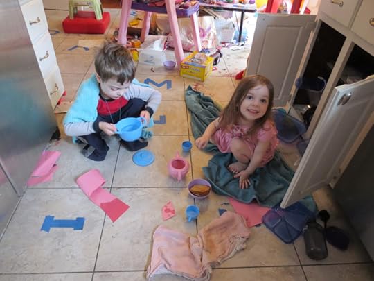 And here's my little two year old, who created this tea party for her brother and me all on her own! Guess what? I also didn't lose the ability to write by giving birth to her. Hmmm...