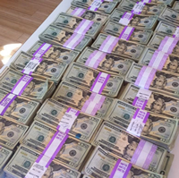 As promised, here's the photo of $211,223 in cash we raised for charity