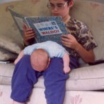 Two children reading Where's Waldo