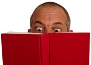 man reading books