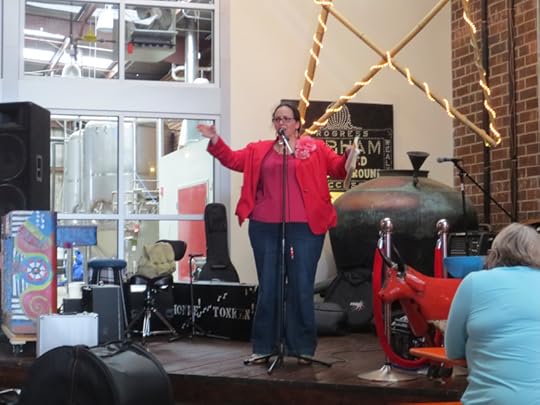 Reading from a climactic scene, with an outburst of song!