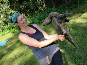 Lori and a snapping turtle. I call this Turtle Yoga. ;-)