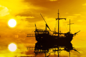 Sailing boat silhouette at sunset