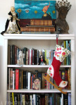 Stockings on a bookshelf