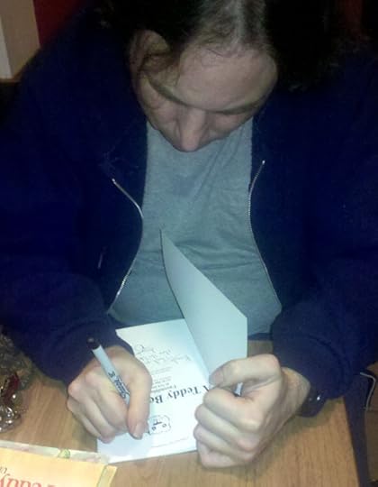 Dan Nokes signing a Teddy Bear Tale