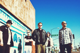 Dan Somers (center) and band members, in Phoenix. From the Lisa Savidge website.