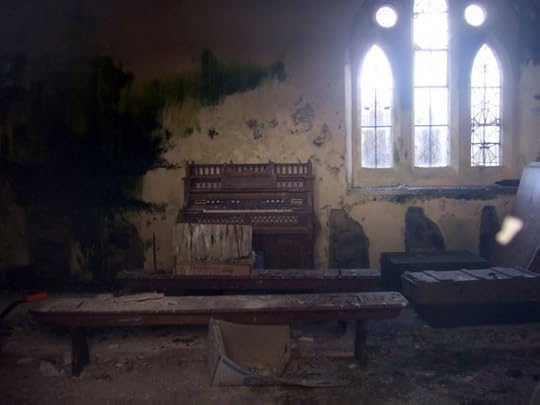 Through the old church window birds form Llanllawer church's only congregation now. The organ, which is an American 'Thomas', has been left abandoned. Near to Llanychaer, Pembrokeshire-Sir Benfro, Great Britain. By Ceridwen on Geograph.org.uk.