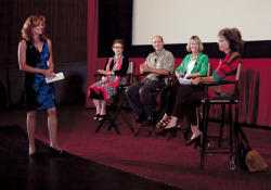 Sonia with Panelists on stage