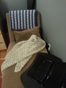 An afghan and shawl that mom crocheted that keep me cozy when I'm writing.
