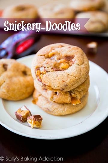 Soft-baked & chewy Snickerdoodle Cookies stuffed with gooey, melty Snickers Bars. Ready in less than 30 minutes! sallysbakingaddiction.com