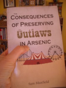 Holding book in my grubby paws.