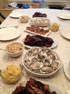Oysters on the half-shell, port-braised short ribs, pork belly appies, sweet potato mash, and quinoa salad.
