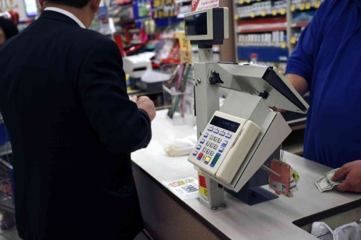 Two People at the Checkout Counter