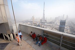 English: Dubai construction workers having the...