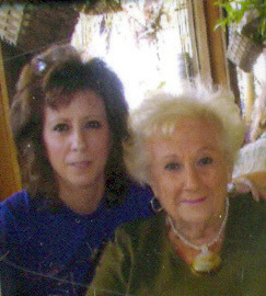 Me and my mom, a few years ago during a beach vacation. She loved the shore. Wow, my hair was short! 