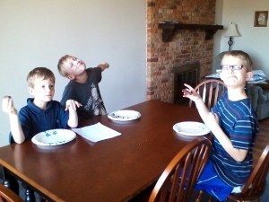 The kids ate them before I could get a picture of them with the cookies. (My fourth kid was on his way home from school. He's deaf so he goes to a different school from the others. Don't worry, he got some cookies at dinner.)