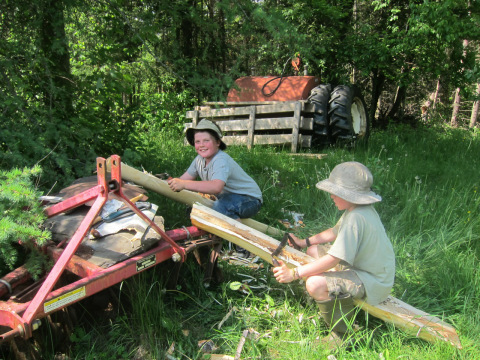 Another photo of the boys working on their shave horses. I like this because Fin looks so damn happy. 