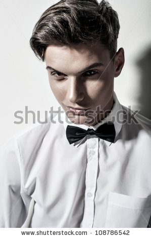 Sexy young elegant man on white - stock photo
