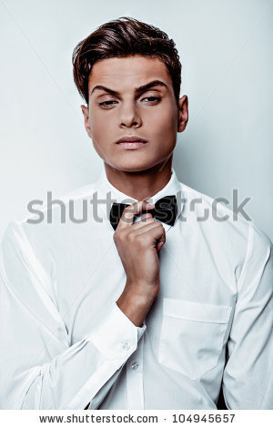 Sexy young elegant man on white - stock photo