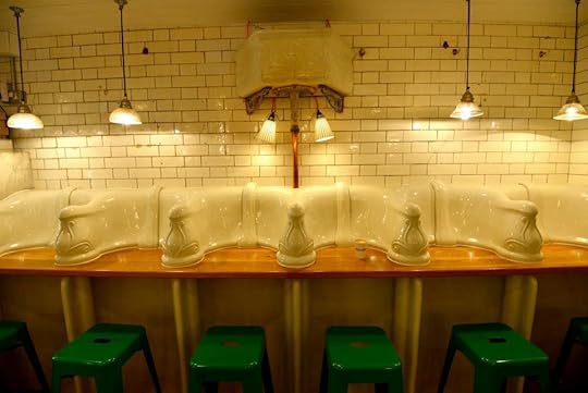 public toilet turned into coffee shop