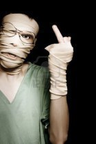 16008774-person-wrapped-in-bandages-with-head-trauma-giving-rude-gesture-in-a-depiction-of-a-impatient-medica