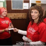 Counselor Kris Work hands out audio CD's from her Mini-workshop of recording the authors reading of the stories they had written.