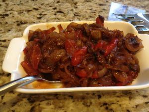 Accompanied by a jam of caramelized onions and peppers.