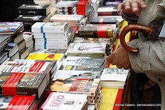 the books for sale and the umbrella