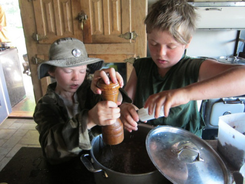 The boys making (surprisingly tasty) woodchuck chili